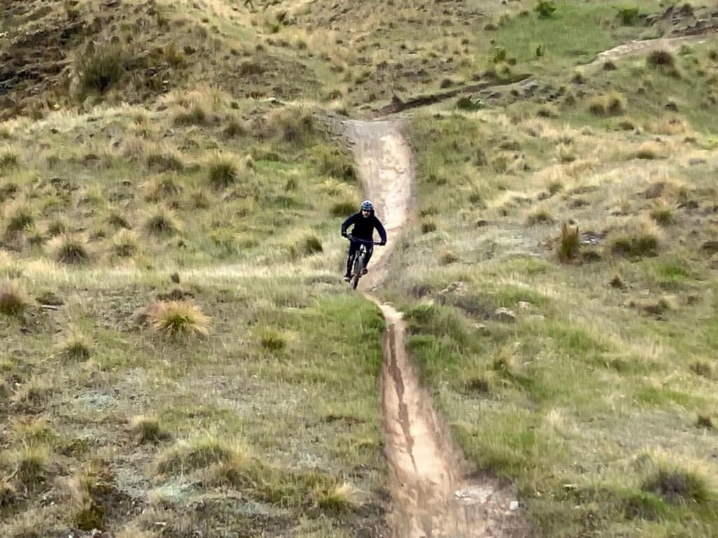 Mountain biker enjoying Port Hills on EMTB tour