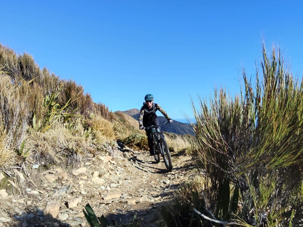 female mountain bike rider on the Paparoa