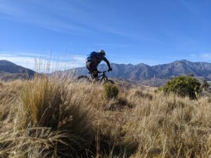 rider on mtb tour in tussock