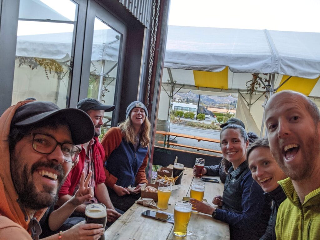 group of smiling riders on mountain bike tour