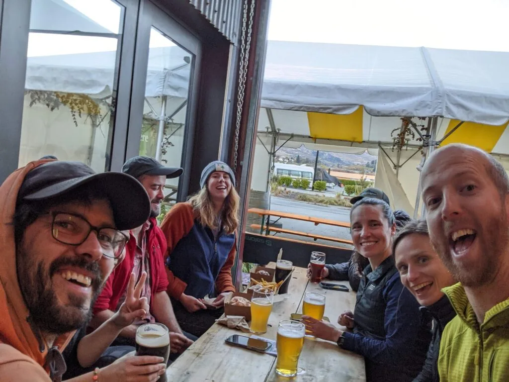 group of smiling riders on mountain bike tour
