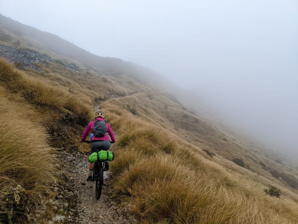 EMTB rider heading into the mist on  the old ghost road