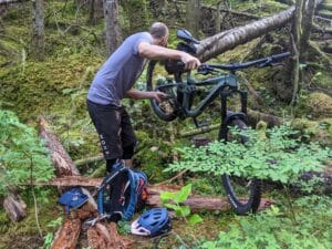 man fixing bike after mechanics course